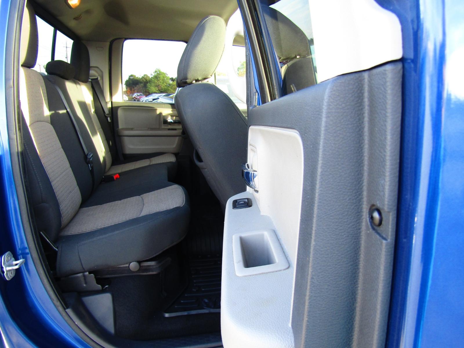 2011 Blue Dodge Ram 1500 SLT Quad Cab 2WD (1D7RB1GT3BS) with an 5.7L V8 OHV 16V engine, Automatic transmission, located at 15016 S Hwy 231, Midland City, AL, 36350, (334) 983-3001, 31.306210, -85.495277 - Photo #8
